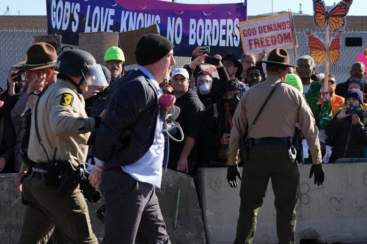 Protesters arrested, officers injured in clash outside Chicago-area ...