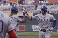 Twins rout Rangers 12-2