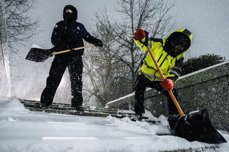 Massive winter storm dumps sleet, freezing rain and snow around much of US