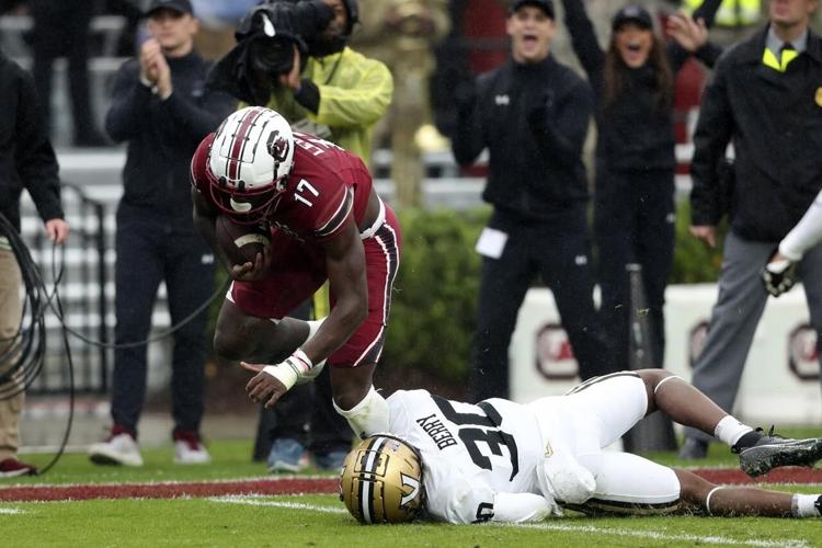 Rattler throws for 3 TDs as South Carolina wins 15th straight over