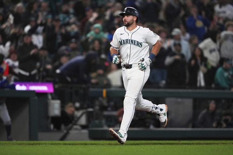 Seattle's Cal Raleigh reaches 100 career HRs by going deep twice at ...