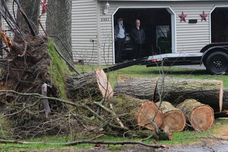 Photos show tornado damage after powerful storms hit Illinois and Indiana