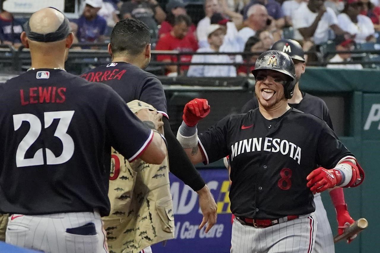 Twins hold on to beat Angels 8-6 and clinch AL Central title