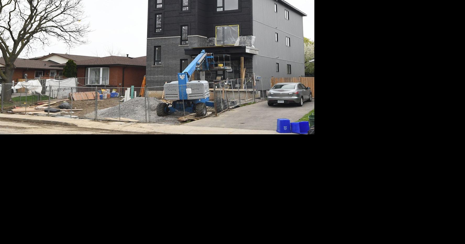 City approved permit for homeowner while building charges against him remained before the courts