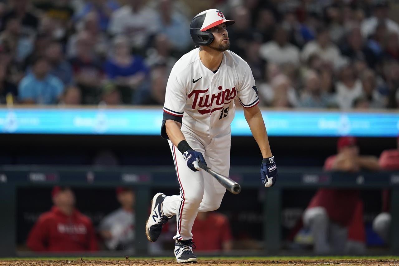 Twins hold on to beat Angels 8-6 and clinch AL Central title