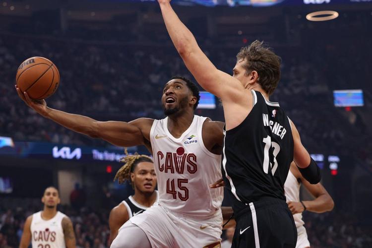 Cavaliers survive a late Nets rally to win home opener 125-121