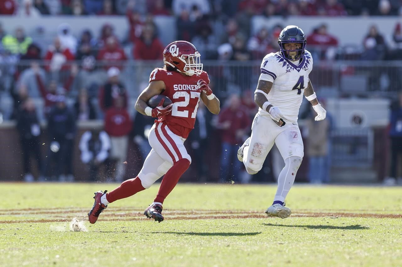 Gabriel Passes For 400 Yards As No. 13 Oklahoma Beats TCU, 69-45, To ...