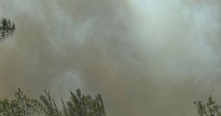 Brush fire, smoky conditions shut down road leading in and out of ...