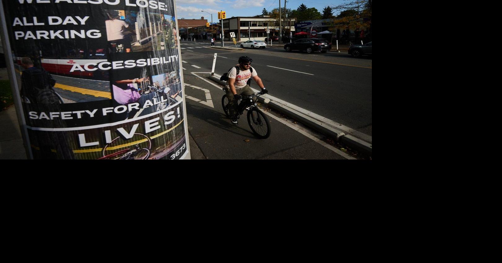 Cycling protest blocks Toronto bike lane removal work along Bloor ...