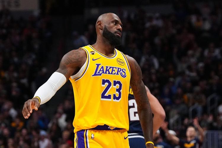 Doncic has a triple-double as the Lakers rally past the short-handed ...