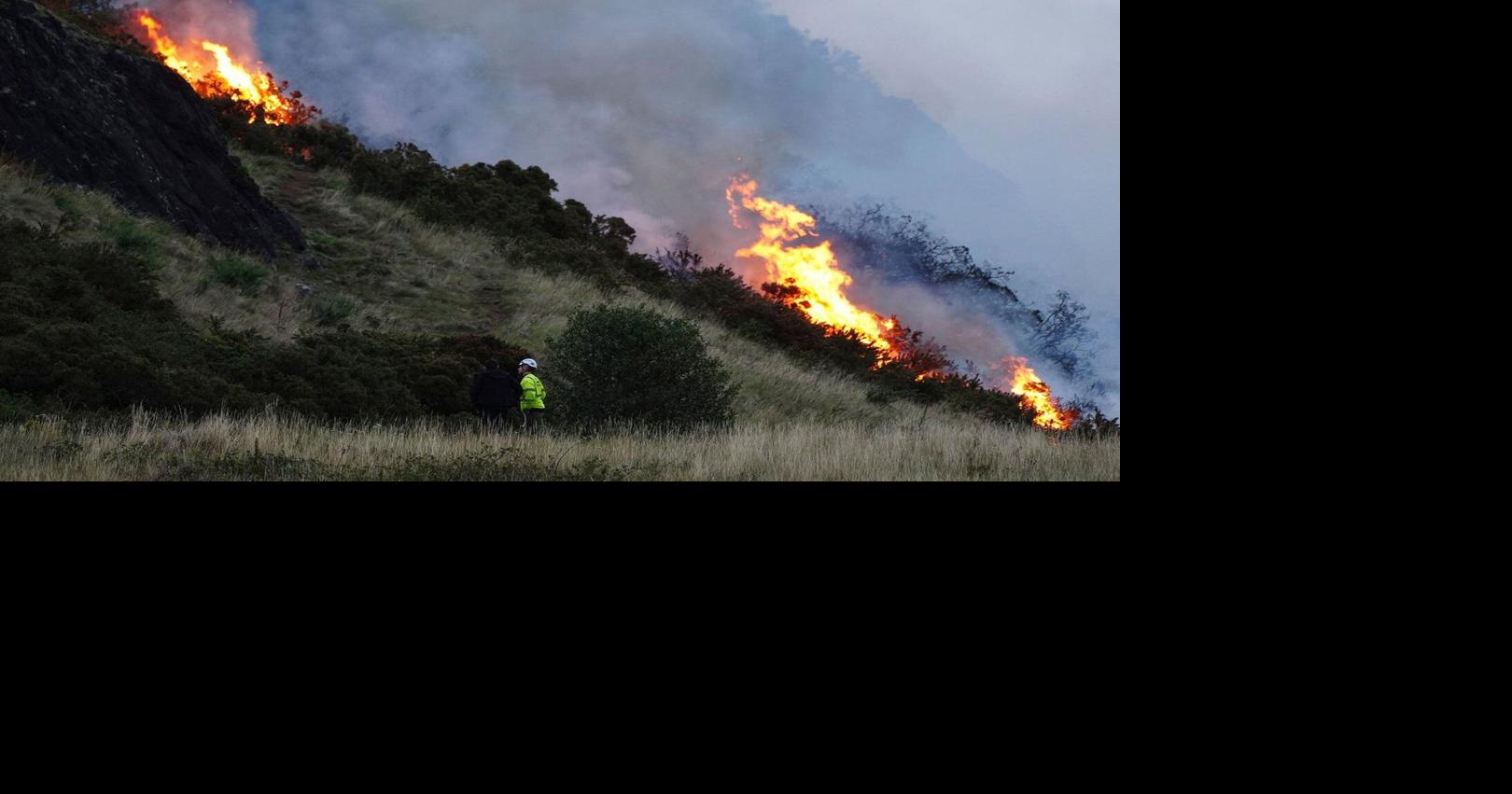Firefighters in Scotland battle large brush fire on hill near Edinburgh