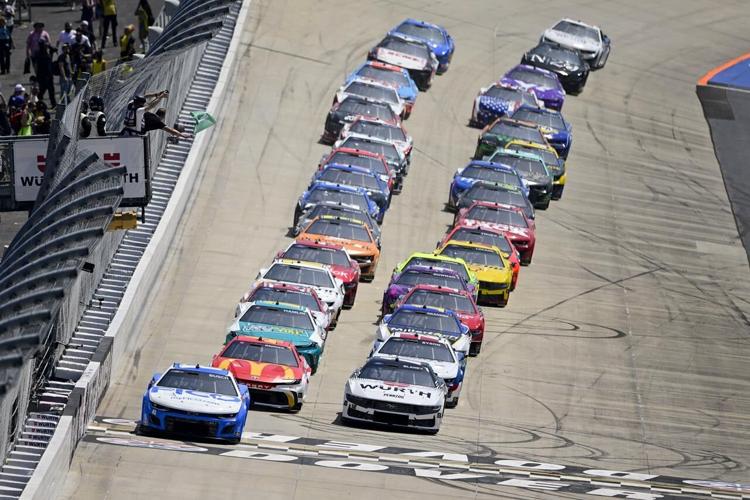 Denny Hamlin holds off Larson late to win NASCAR Cup race at Dover Motor Speedway