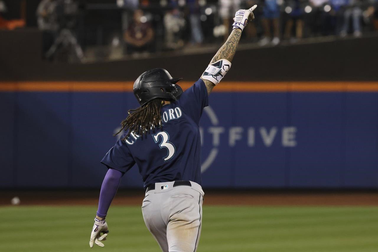 Mariners score 7 in the 8th to cap a 13-1 win over the Orioles