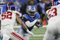 Detroit Lions running back Jahmyr Gibbs (26) warms up before the first half  of a preseason NFL football game between the Detroit Lions and the  Jacksonville Jaguars, Saturday, Aug. 19, 2023, in