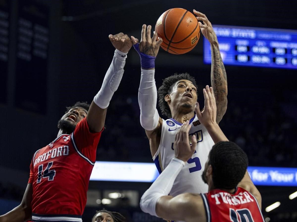 James, Traynor rally Louisville to 94-93 victory over UMBC