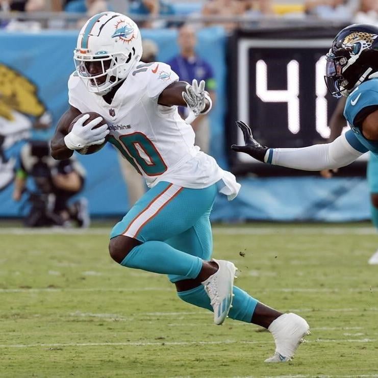 Daewood Davis of Dolphins carted off field after collision; preseason game  vs. Jaguars halted