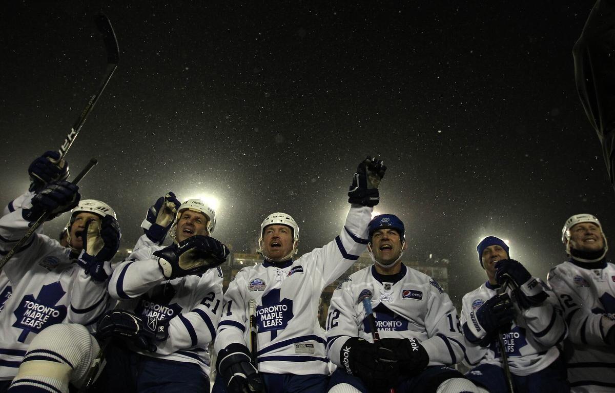 Toronto Maple Leafs players line up for the Canadian national anthem before  playing against the Buffalo Sabres in the NHL Heritage Classic hockey game  in Hamilton, Ontario, on Sunday, March 13, 2022. (