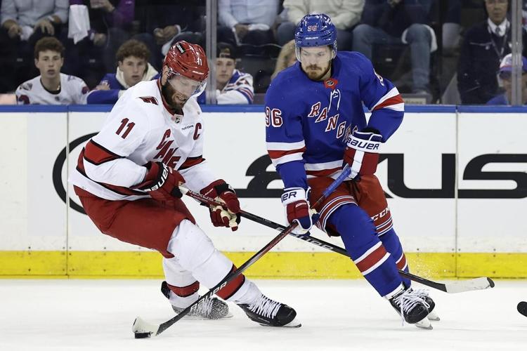 Hurricanes score 4 in third period, rally to beat Rangers 41 to stay alive