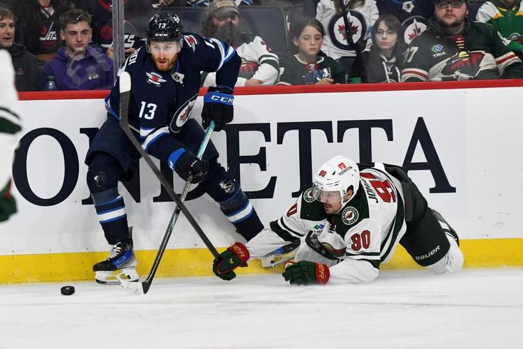 Jets outlast Wild 21 in OT for third straight win