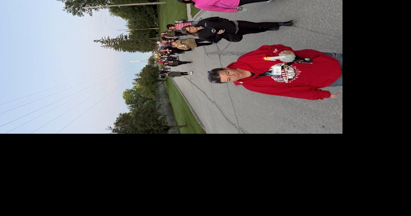 Portage walks from darkness into light for suicide awareness