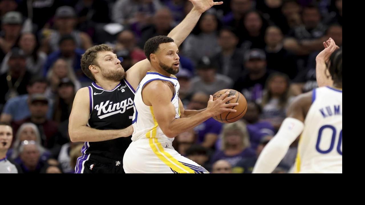 Curry scores 31 in return as Warriors defeat Lakers 128-121