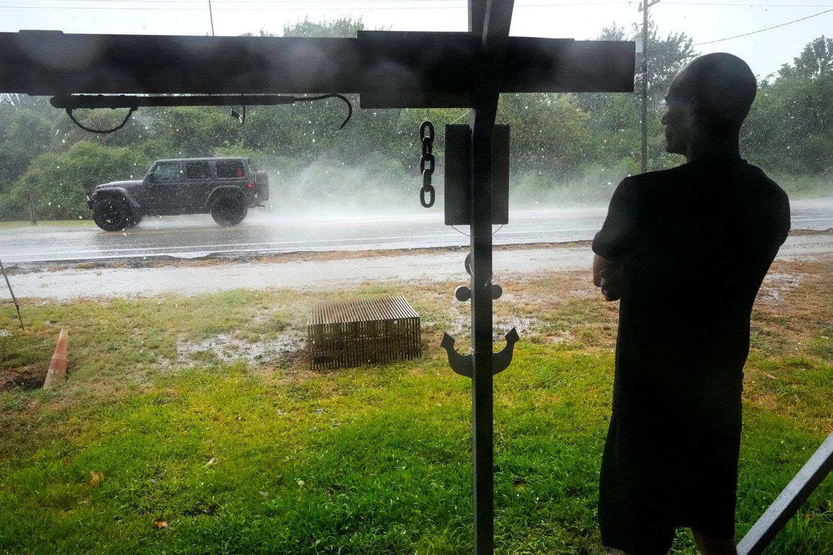 Tropical Depression Edouard drenches Texas with flash flooding and downed trees as it moves north; 75,000 without power