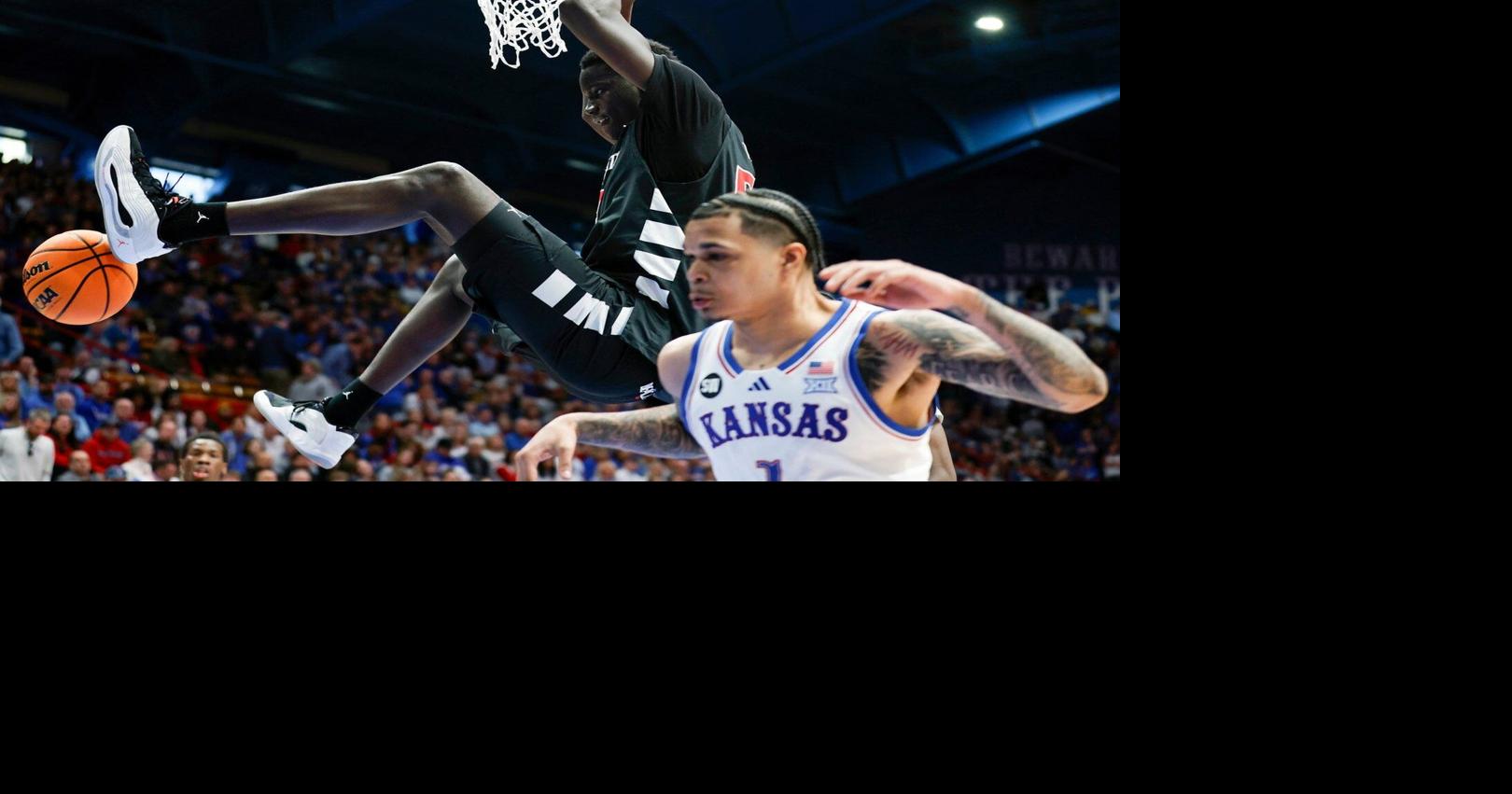 Thiam scores career-high 28 to lead Cincinnati to an 84-68 upset of No. 8 Kansas