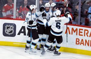 Kerfoot has a goal and 2 assists in Utah's 5-2 victory over the Blackhawks