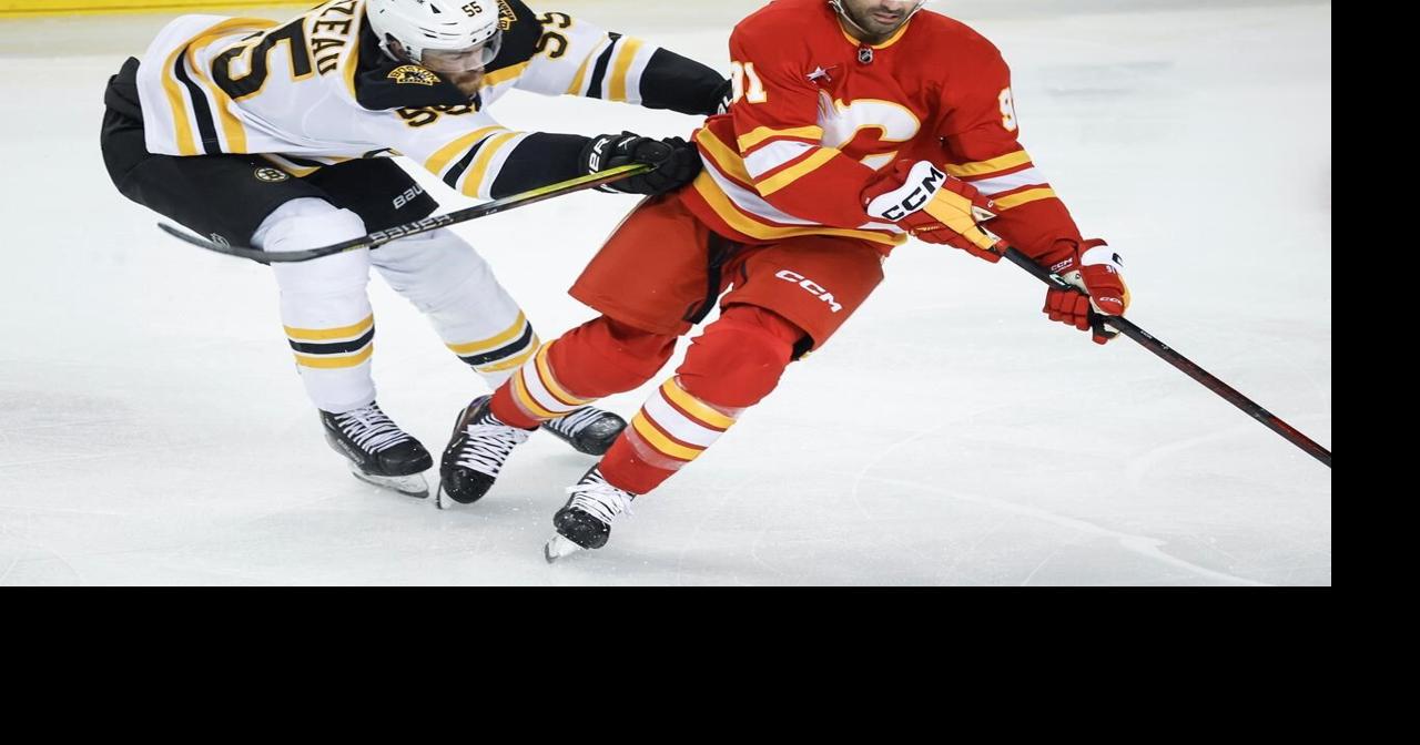 Pastrnak scores in OT as Bruins rally to beat Flames 4-3