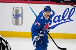 Avs forward Nathan MacKinnon becomes 1st to 50 goals this season with early score against Canucks