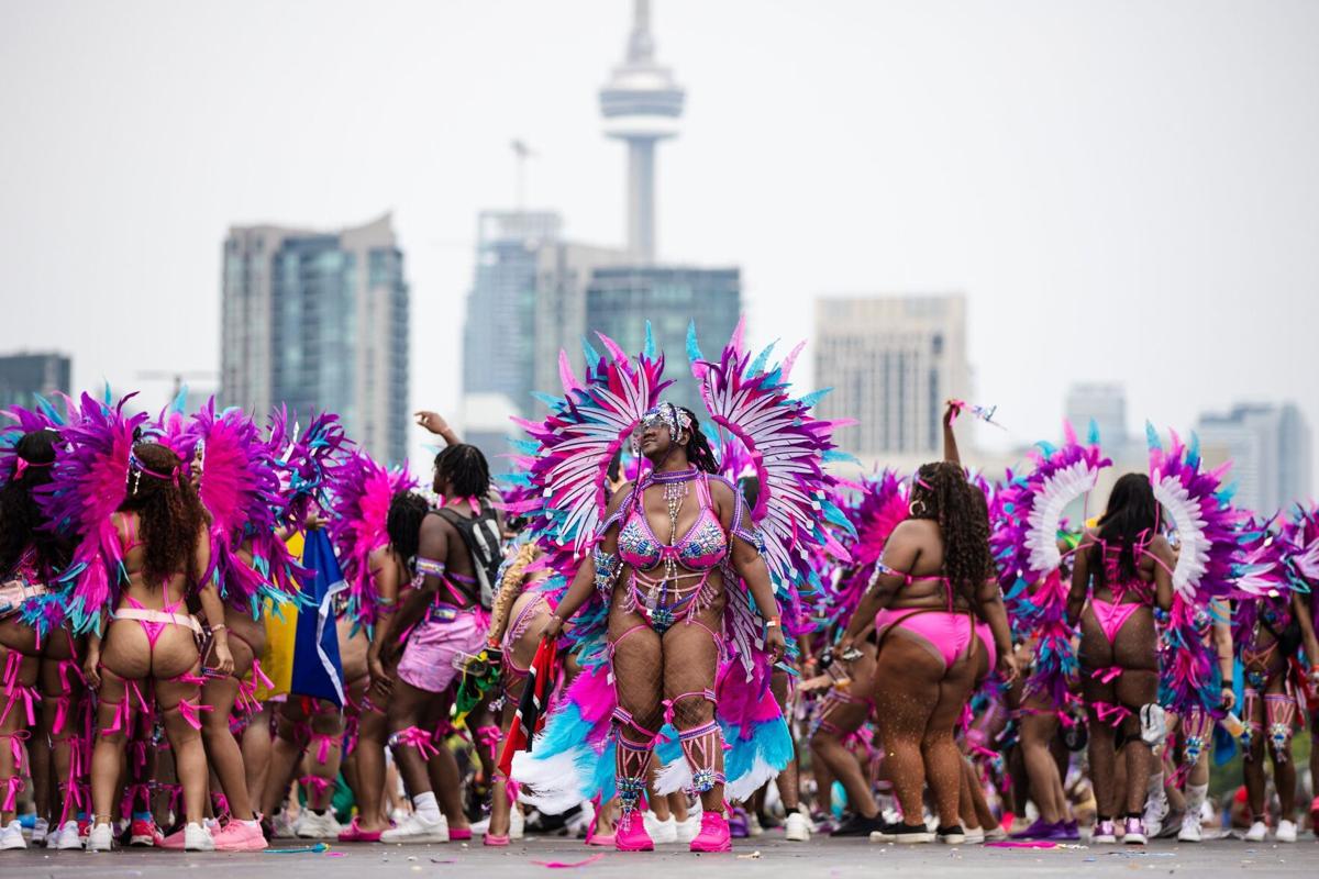 Caribbean Carnival parade dancers, mas bands deliver sizzle