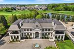 This $9.99-million Aurora estate offers rare waterfall and golf court access and views