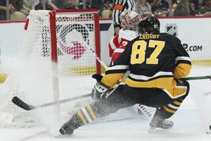 Crosby reaches 1,000 assists, Karlsson nets winner as Pens boost playoff odds by edging Detroit 6-5