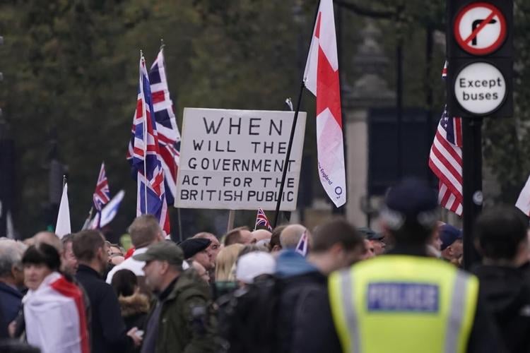 Supporters of far-right British figure rally as anti-racism ...