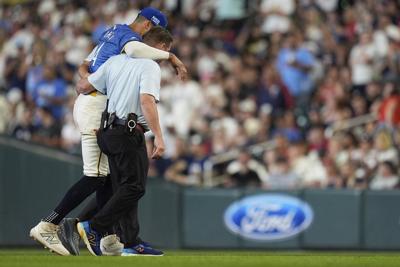 Twins shortstop Carlos Correa sprains ankle when baserunner slides into him at 2nd