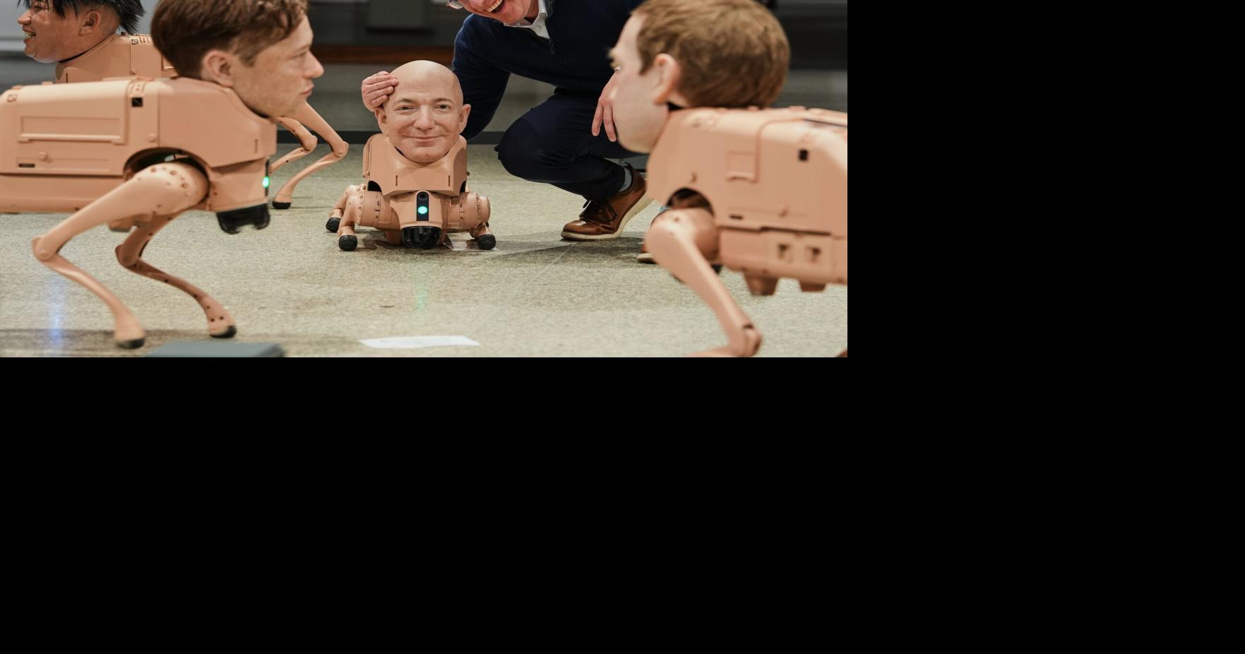 Robot dogs with Musk and Zuckerberg heads roam around Berlin museum in Beeple's new exhibit