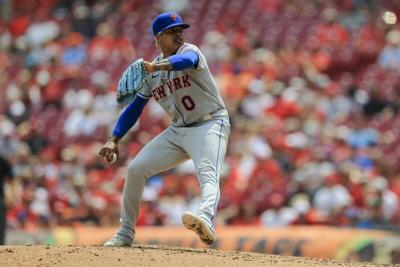 New York Mets starting pitcher Marcus Stroman stands on the mound