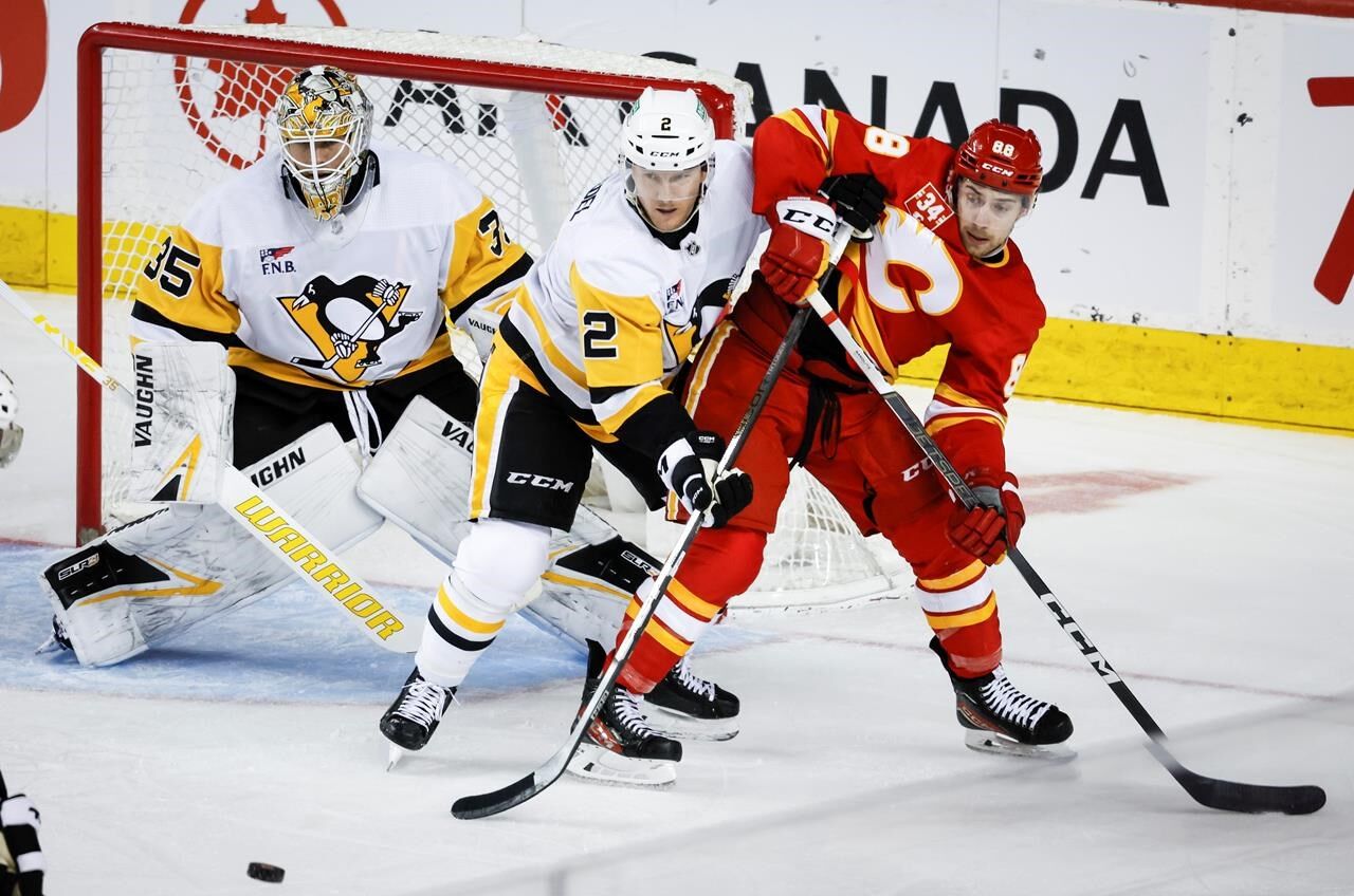 Sharangovich Shines As Flames Rally To Burn Penguins 4-3