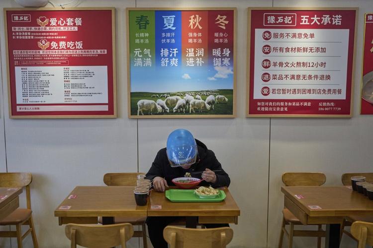 China's army of food delivery drivers get by with help from discount 'loving meals'