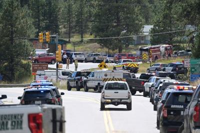 Authorities say student who had been radicalized fired revolver at Colorado school, wounding 2