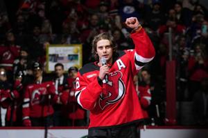 Olympic star Jack Hughes returns to NHL, jokes about his missing teeth as Devils resume playoff push