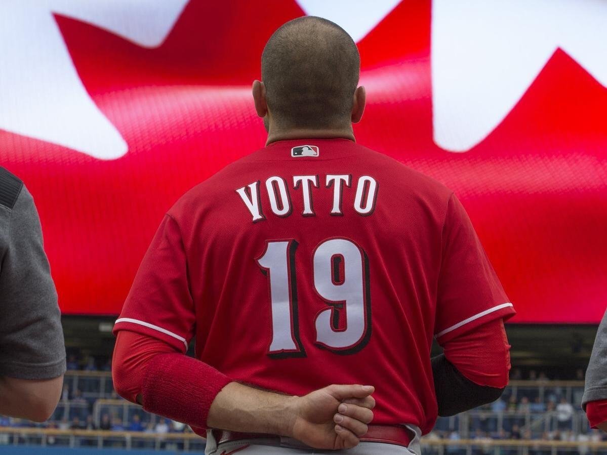 Votto traded his jersey for a Reds fan's shirt