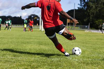 Sponsored Image Farm Workers playing soccer 2