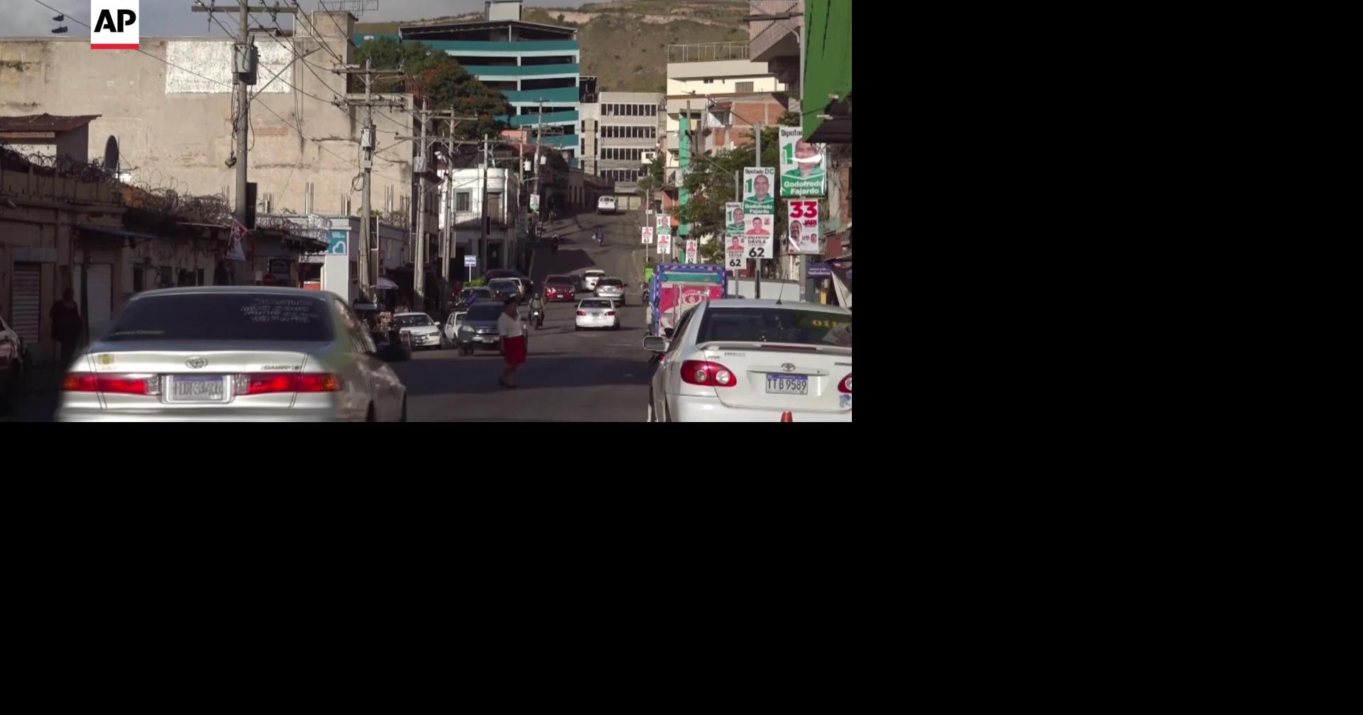 Conservatives ahead of governing party in Honduras presidential vote, as Trump effect debated