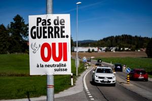 Voters in Switzerland decide on right-wing party's proposal to tighten neutrality rules