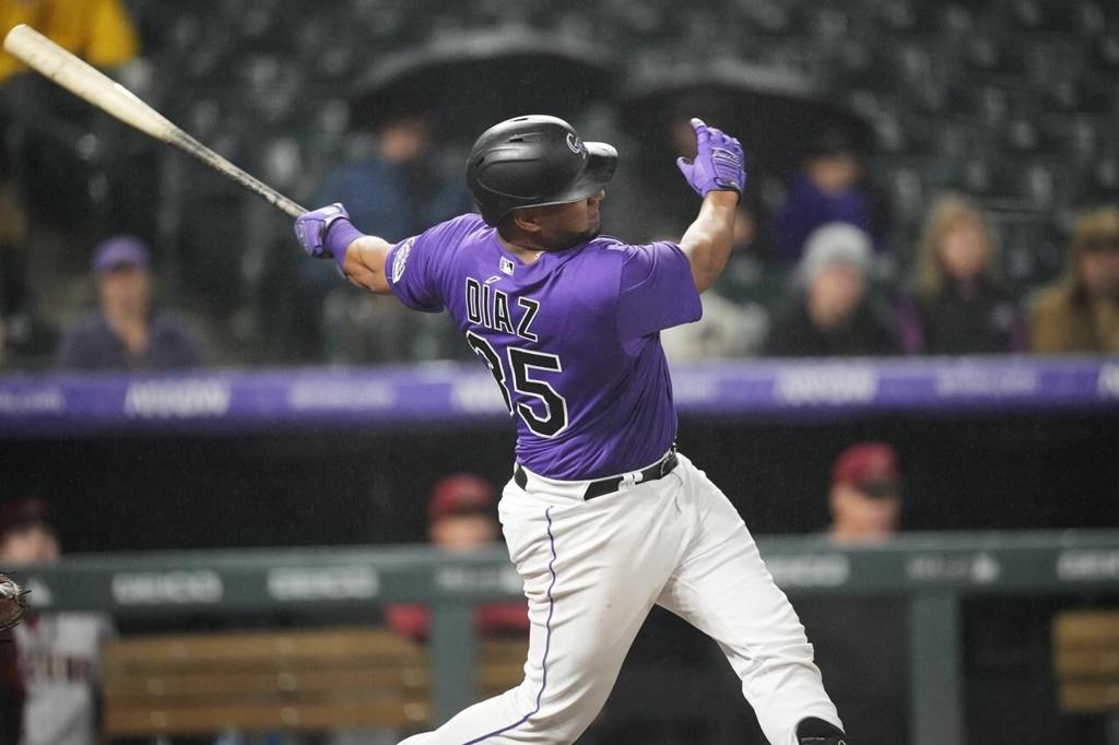 Rockies beat D-backs with five home runs, including a 504-foot blast by  C.J. Cron and a walk-off by Elias Diaz