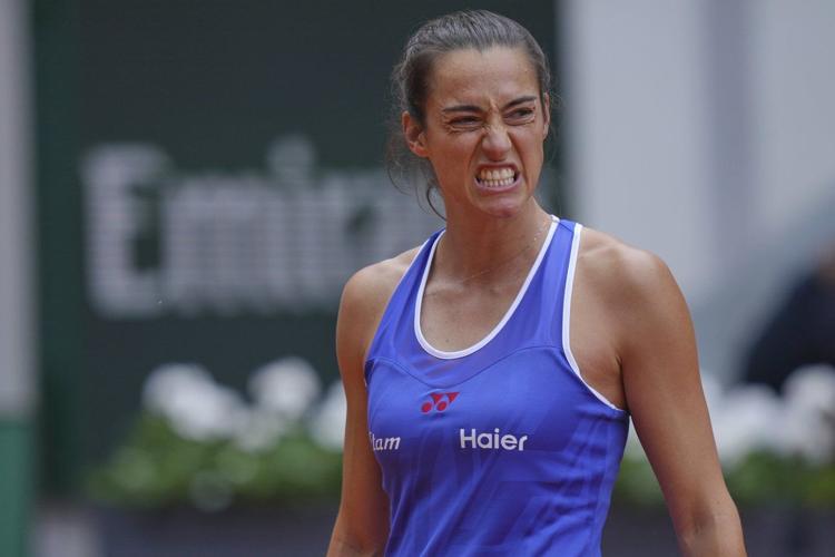 A teary-eyed Caroline Garcia plays her final French Open match