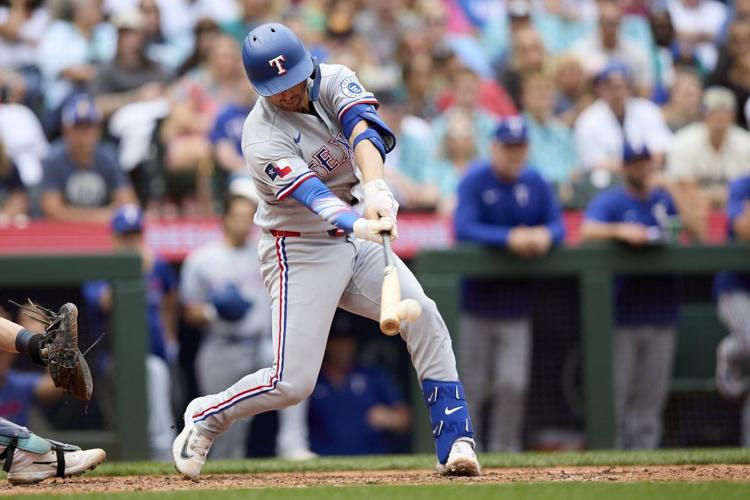 Wyatt Langford helps the Texas Rangers beat the Seattle Mariners 6-4 in 11 innings