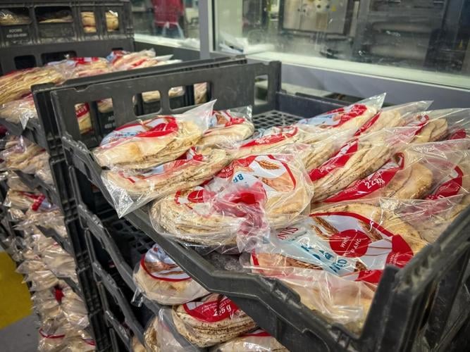 Marché Adonis’s beloved pita machine working again