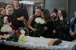 Young Kyiv couple killed in a fierce Russian airstrike hoped to start a family, mourners say